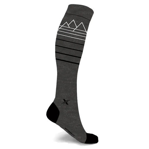 Happywool knee high merino wool blend compression boot socks, charcoal with white mountain design near cuff